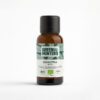 green_hunters_ A brown bottle labeled Organic Eucalyptus Essential Oil features green leaves and eco-friendly symbols. It holds 30ml and has a black cap, reflecting fair trade values.